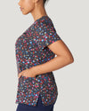 Print: Spkt - White Cross Women's Scrub Tops - Side View